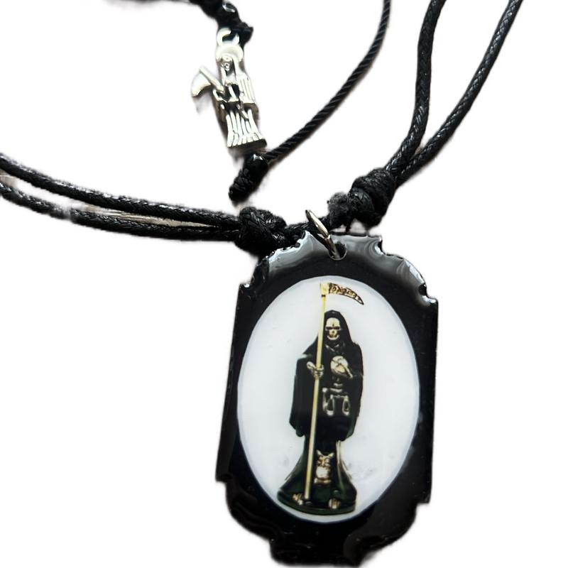 Black Santa Muerte necklace and bracelet unisex matching set. Adjustable sizes on both.