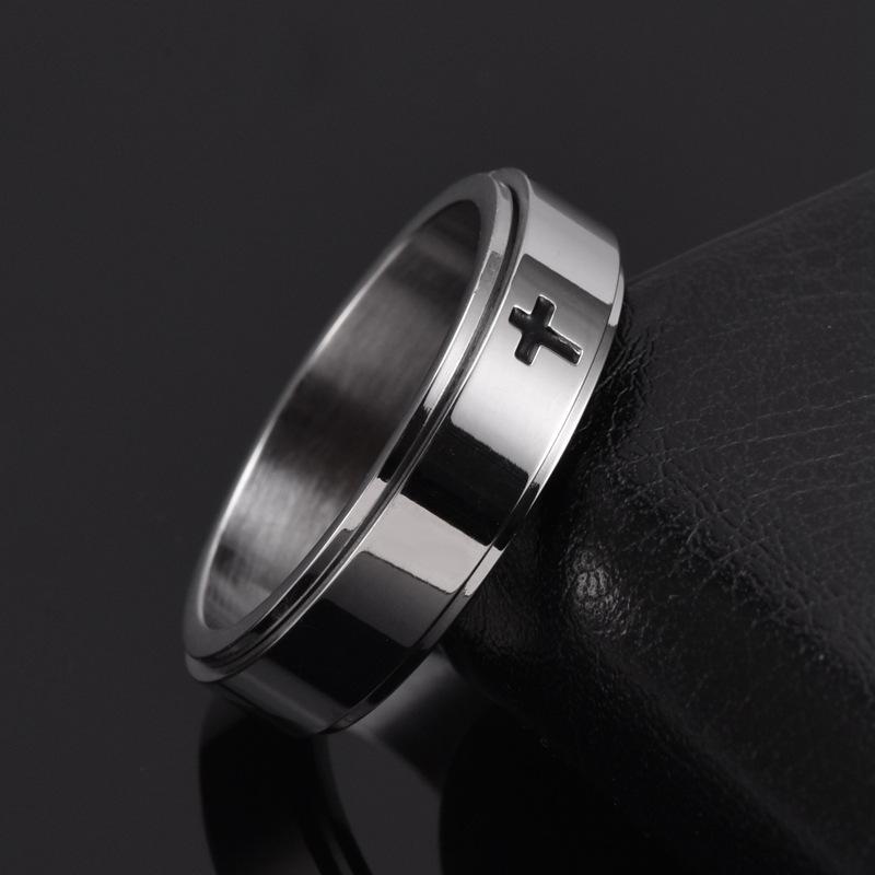 Rotatable decompression ring for male and female crosses men's ring