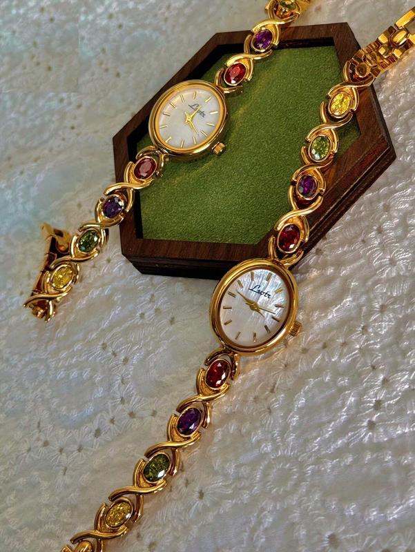 High-End Luxury Women's Watch with Colorful Tourmalines, Diamonds, and Mother of Pearl Dial