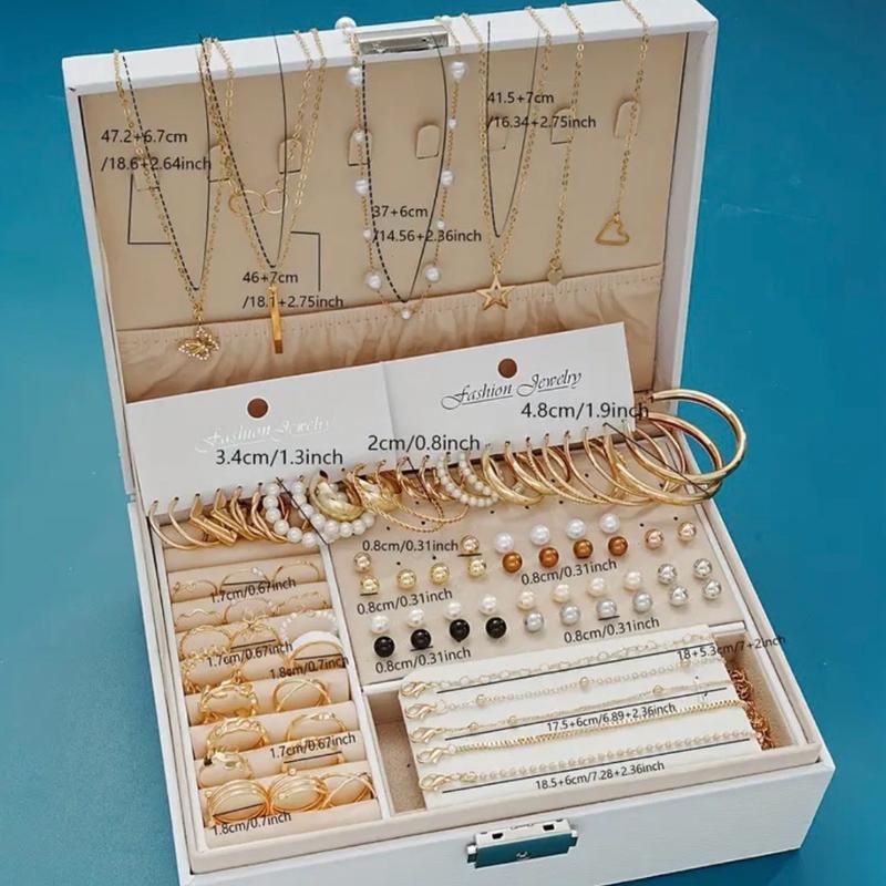 56 piece jewelry set. Earrings, rings, necklace