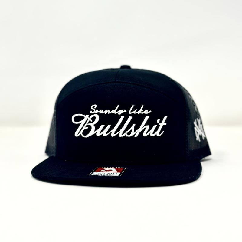 Sounds Like BS Trucker Trucker Hat by The Mad Hatter Co.